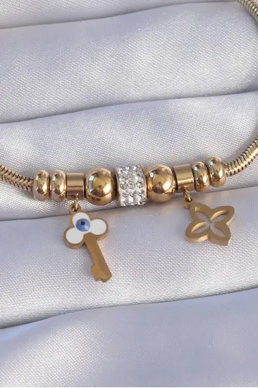 316L Çelik Gold Renk Zirkon Taşlı Yonca Detay Nazarlı Anahtar Tasarımlı Bileklik 316L Çelik Gold Renk Zirkon Taşlı Yonca Detay Nazarlı Anahtar Tasarımlı Bileklik